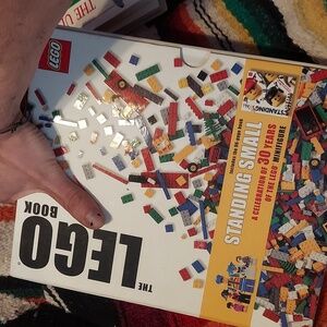 The lego book hard cover set. Lego book and standing small. Collectable!¡